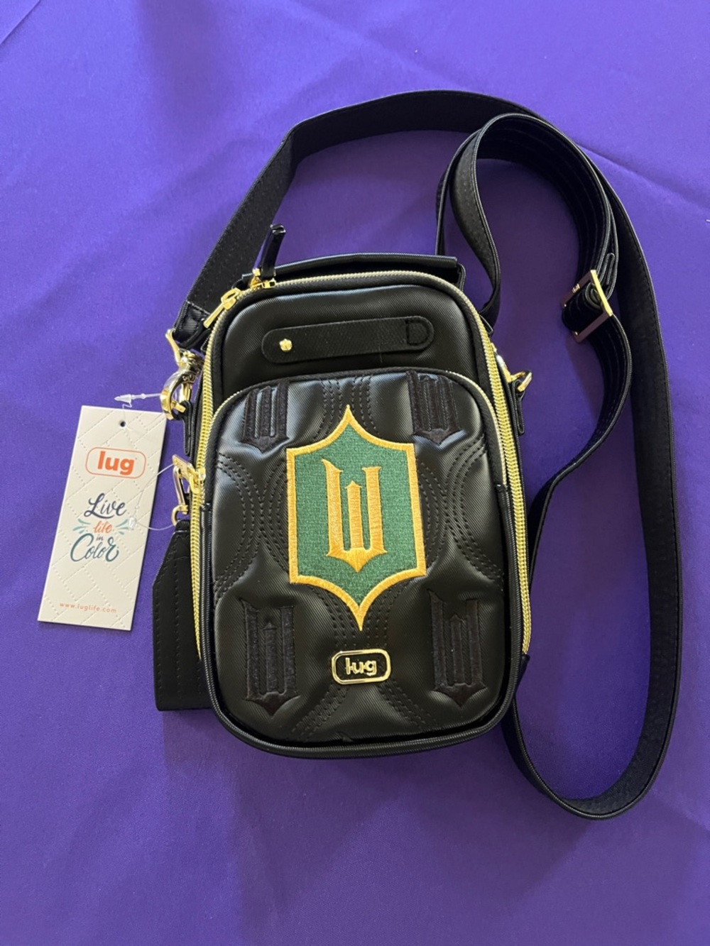 Lug Wicked collection Black Crossbody Phone Bag with Green & pink interior